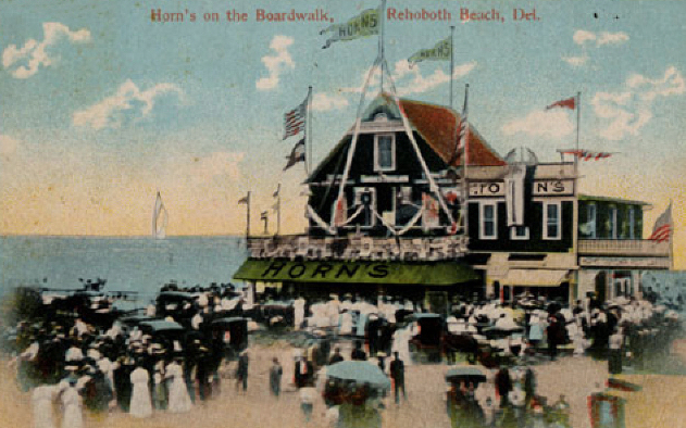 Since its founding, the Rehoboth Beach downtown and Boardwalk have been a tourist destination. In the early 1900s, people came from near and far to see Horn’s Pavilion along the ocean at the end of Rehoboth Avenue. POSTCARD COLLECTION, DELAWARE PUBLIC ARCHIVES